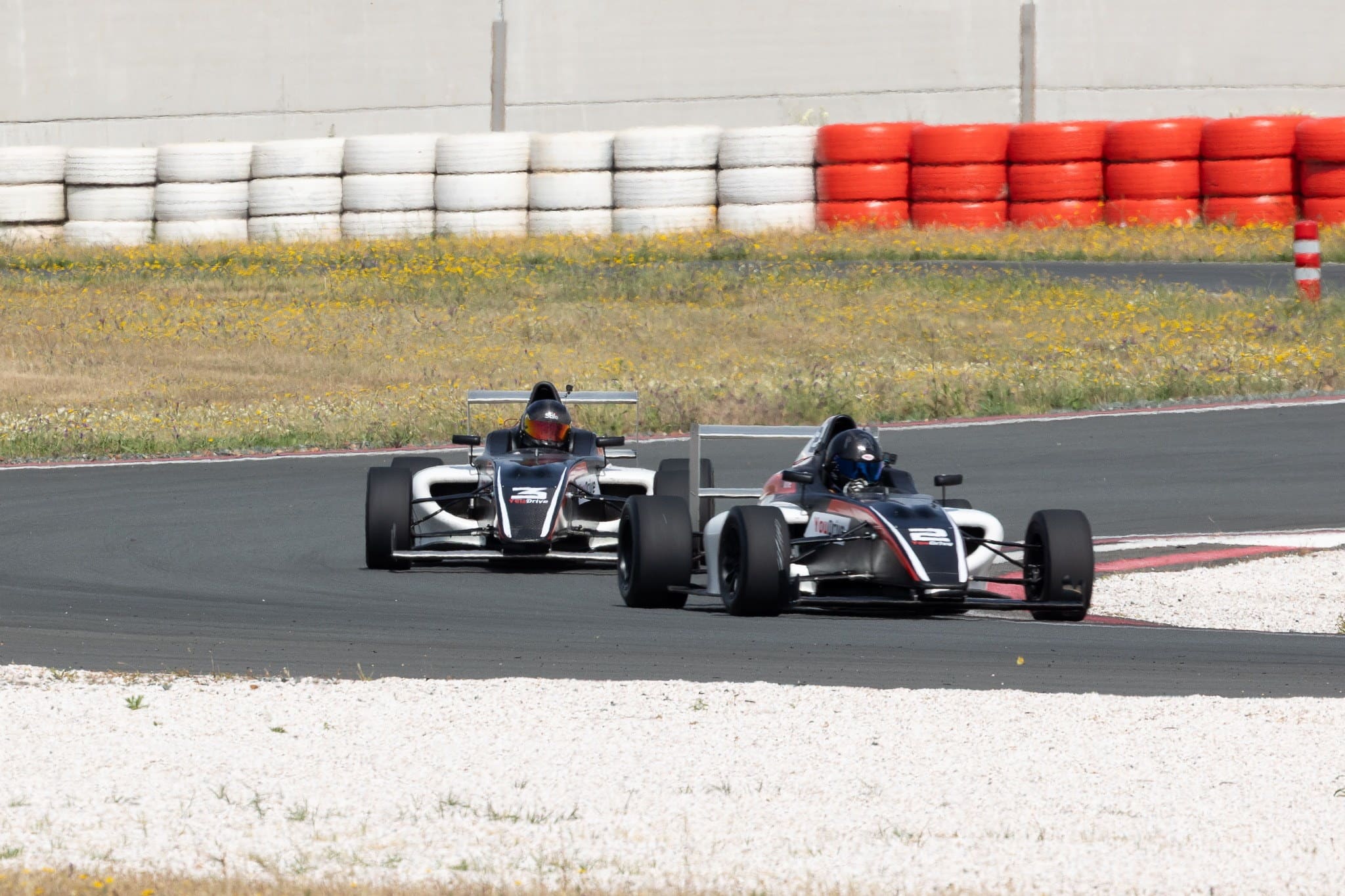 YouDrive Formula 4 track experience scene from the paddock.